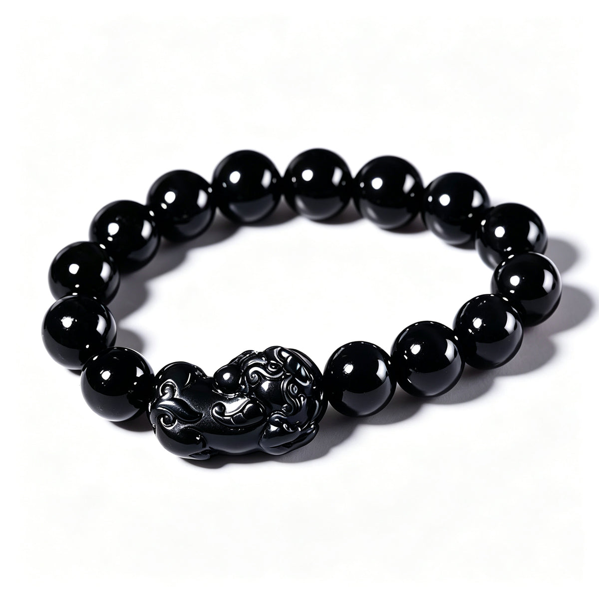 Polished black obsidian beads detail – WUFORGE
