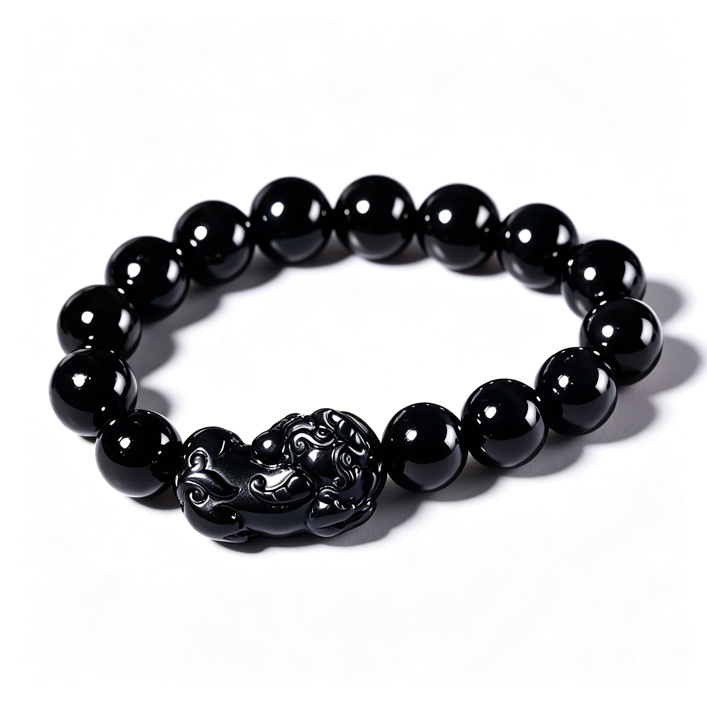 Polished black obsidian beads detail – WUFORGE